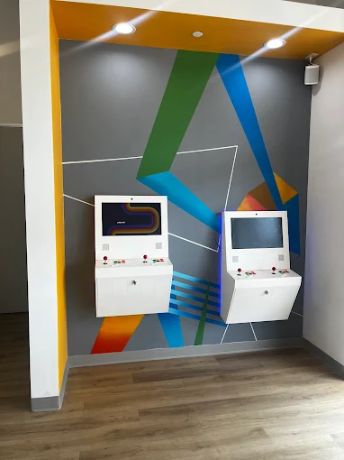 Hallway at TruSmile Orthodontics in Long Beach, showing sleek floors and doors leading to patient rooms