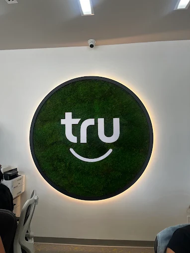 Reception area at TruSmile Orthodontics in Long Beach, featuring modern seating and a welcoming design